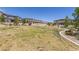 Community playground with green grass and play equipment at 6208 Rathbone St, Las Vegas, NV 89166