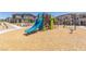 Community playground featuring slides and climbing equipment at 6208 Rathbone St, Las Vegas, NV 89166