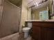 Bathroom featuring a shower, toilet, vanity with mirror and lighting at 6250 W Flamingo Rd # 135, Las Vegas, NV 89103