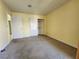 Bedroom with carpet flooring, standard closet, and white doors at 6250 W Flamingo Rd # 135, Las Vegas, NV 89103