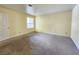 Empty bedroom with wall-to-wall carpet, ample natural light, and an open floorplan at 6250 W Flamingo Rd # 135, Las Vegas, NV 89103