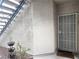 Apartment entryway with secure door and wrought iron basket at 6250 W Flamingo Rd # 135, Las Vegas, NV 89103