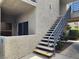 Apartment exterior with outdoor staircase leading to upper units at 6250 W Flamingo Rd # 135, Las Vegas, NV 89103