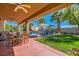 Expansive backyard featuring a pool, patio, and meticulously maintained lawn, perfect for entertaining at 6527 Lokai Ave, Las Vegas, NV 89130