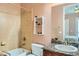 Bathroom with tile shower, granite countertop sink and modern fixtures at 6527 Lokai Ave, Las Vegas, NV 89130