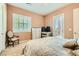 Comfortable bedroom with carpet flooring, a sliding glass door, and a closet at 6527 Lokai Ave, Las Vegas, NV 89130