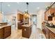 Beautiful kitchen featuring a breakfast bar, granite countertops, and stainless steel appliances at 6527 Lokai Ave, Las Vegas, NV 89130