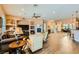 Spacious living room with a fireplace, wood floors, and plush seating at 6527 Lokai Ave, Las Vegas, NV 89130