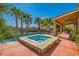 Stunning backyard features a dazzling pool and spa, and covered patio with ample seating for outdoor entertainment at 6527 Lokai Ave, Las Vegas, NV 89130