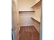 Walk-in closet with built-in shelving and clothing rods offering plenty of storage space at 700 Carnegie St # 2013, Henderson, NV 89052
