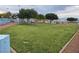 Well-maintained community dog park offering green space and play structures at 700 Carnegie St # 2013, Henderson, NV 89052