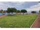 Well-maintained community dog park offering green space and play structures at 700 Carnegie St # 2013, Henderson, NV 89052