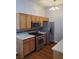 Well-lit kitchen features stainless steel appliances, light wood cabinets and countertops at 700 Carnegie St # 2013, Henderson, NV 89052