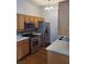 Kitchen features stainless steel appliances including a gas range, refrigerator, and microwave oven at 700 Carnegie St # 2013, Henderson, NV 89052