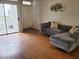The well-lit living room is complimented by hardwood floors and a sofa with ample space at 700 Carnegie St # 2013, Henderson, NV 89052