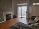 The modern living room showcases a fireplace and a sliding glass door to the balcony at 700 Carnegie St # 2013, Henderson, NV 89052