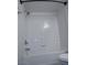 Bathroom features white tiled tub and shower at 7255 W Sunset Rd # 2093, Las Vegas, NV 89113