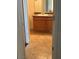 Bathroom features a vanity, mirror, and tile flooring at 7255 W Sunset Rd # 2093, Las Vegas, NV 89113