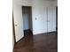 Bedroom featuring new floors, closet, and clean bright walls at 7255 W Sunset Rd # 2093, Las Vegas, NV 89113