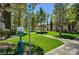 Dog park area with pet waste station. A pet-friendly community with green surroundings at 7255 W Sunset Rd # 2093, Las Vegas, NV 89113