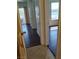 Hallway with dark wood flooring leading to bedroom and living spaces at 7255 W Sunset Rd # 2093, Las Vegas, NV 89113