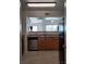 View of the eat-in kitchen offering stainless steel appliances and light wood cabinets at 7255 W Sunset Rd # 2093, Las Vegas, NV 89113