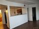 Cozy living area features an opening to kitchen and entry to bathroom at 7255 W Sunset Rd # 2093, Las Vegas, NV 89113