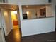 Comfortable living area offering open sightlines into kitchen and bathroom at 7255 W Sunset Rd # 2093, Las Vegas, NV 89113