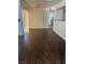 The light-filled living room boasts hardwood floors at 7255 W Sunset Rd # 2093, Las Vegas, NV 89113