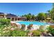 Relaxing pool and sundeck surrounded by lush greenery, perfect for leisure at 7255 W Sunset Rd # 2093, Las Vegas, NV 89113