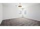 Spacious bedroom features plush carpeting, neutral walls, and natural light from the windows at 7624 Molfetta St, Las Vegas, NV 89149