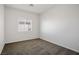 Bedroom featuring neutral carpet, light walls, and ample natural light at 7624 Molfetta St, Las Vegas, NV 89149