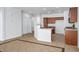 Open kitchen area with tile floors and view of the cabinets and countertops at 7624 Molfetta St, Las Vegas, NV 89149