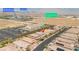 Aerial view showcasing a residential area near Durango Hotel, Sierra Vista High School, and a church at 7837 Hamilton Pool Dr, Las Vegas, NV 89113