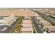 Expansive aerial view showing a residential neighborhood with a church and desert landscape backdrop at 7837 Hamilton Pool Dr, Las Vegas, NV 89113