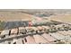 Overhead view of a neighborhood, highlighting rooftops, landscaping, and street layout in a residential area at 7837 Hamilton Pool Dr, Las Vegas, NV 89113