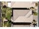 High-angle aerial view displays the rooflines and landscaping details of adjacent homes in a neighborhood setting at 7837 Hamilton Pool Dr, Las Vegas, NV 89113