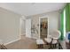 Inviting Bedroom showcasing a glider and a glimpse into a well-organized closet at 7837 Hamilton Pool Dr, Las Vegas, NV 89113