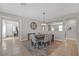 Dining room featuring modern light fixture and seamless flow to other rooms at 7837 Hamilton Pool Dr, Las Vegas, NV 89113