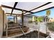 Backyard featuring raised garden beds, desert landscaping, and a covered patio with views of the home at 7913 Rushmore Ave, Las Vegas, NV 89131