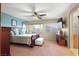 Cozy bedroom featuring a ceiling fan and a comfortable bed, creating a relaxing retreat at 7913 Rushmore Ave, Las Vegas, NV 89131