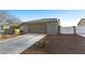 Well-maintained single-Gathering home with a two-car garage and low-maintenance desert landscaping at 7913 Rushmore Ave, Las Vegas, NV 89131