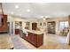 Spacious eat-in kitchen featuring a large island, granite counters, and modern finishes at 7913 Rushmore Ave, Las Vegas, NV 89131