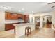 Bright kitchen with granite countertops, a center island with seating, and stainless steel appliances at 7913 Rushmore Ave, Las Vegas, NV 89131