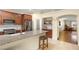Bright, open kitchen with stainless appliances, granite countertops, and access to dining area at 7913 Rushmore Ave, Las Vegas, NV 89131