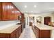Spacious kitchen with custom cabinets, granite countertops, stainless steel appliances, and a large island at 7913 Rushmore Ave, Las Vegas, NV 89131