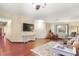 Bright and spacious living room with hardwood flooring and lots of natural light at 7913 Rushmore Ave, Las Vegas, NV 89131