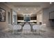 Modern dining room with marble floors, glass table, and contemporary chairs next to kitchen at 80 Glade Hollow Dr, Las Vegas, NV 89135