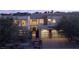 Beautiful modern home with desert landscaping and multi-car garage at 80 Glade Hollow Dr, Las Vegas, NV 89135