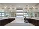 Luxurious bathroom featuring double vanity, large mirrors, and a freestanding tub at 80 Glade Hollow Dr, Las Vegas, NV 89135